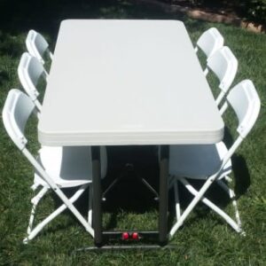 One 6 Foot Table with 6 Folding Chairs